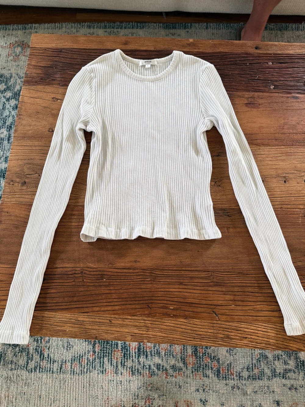 Agolde Black Ribbed Long Sleeve Crew Top with Ruffle Hem